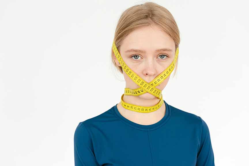 Kid with tape covering mouth symbolizing mental health issues