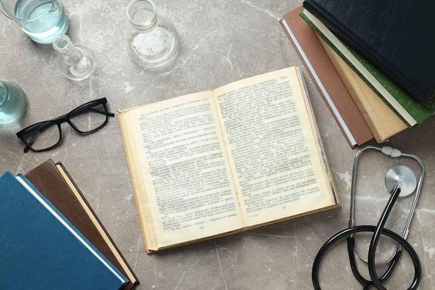 Book glasses and stethoscope