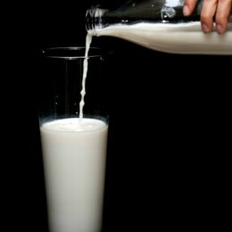 Milk being poured into a glass