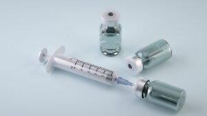 medical syringes and medication bottles